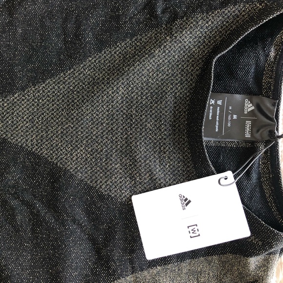 NWT. Wolford STUDIO MOTION CROP Size M
ADIDAS X WOLFORD
Black/Gold - Picture 4 of 6